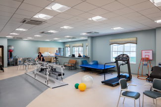 Room with physical therapy equipment