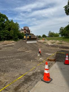 dirt lot with a bulldozer
