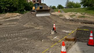 Bulldozer on dirt lot